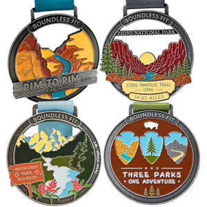 Four Wester Trails Medals: Rim to Rim Grand Canyon, Zion Traverse Mountain, Teton Crest Trail, and Challenge completion physical medals