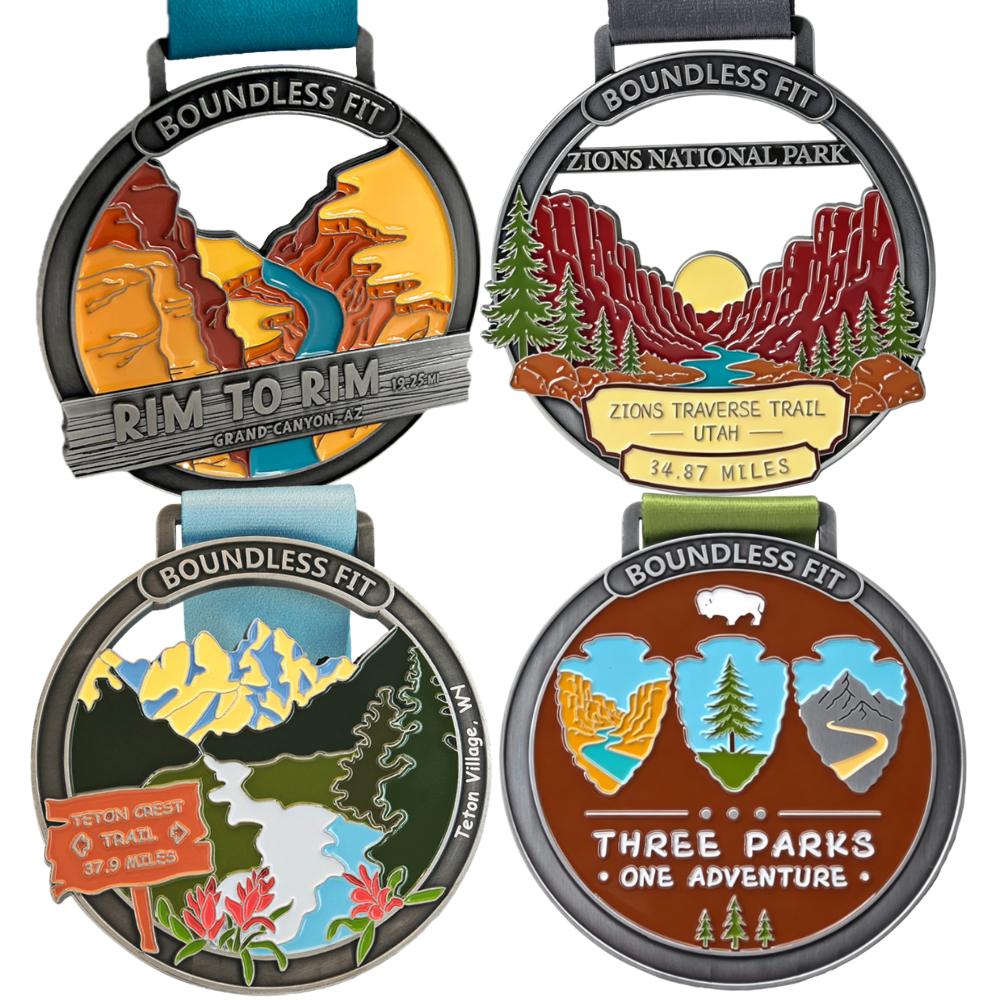 Four Wester Trails Medals: Rim to Rim Grand Canyon, Zion Traverse Mountain, Teton Crest Trail, and Challenge completion physical medals